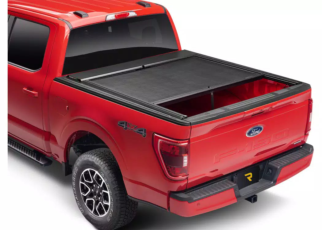 RealTruck Roll-N-Lock M-Series XT Manual Retractable Tonneau Cover w/ T-Slot Rails - 2022-2026 Nissan Frontier — view 3